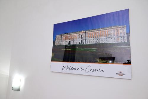 a picture of a building with the words welcome to cyprus at B&B REVOLUTION BED e BREAKFAST in Caserta