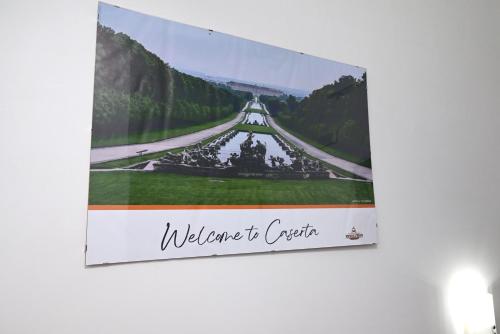 a picture of a sign hanging on a wall at B&B REVOLUTION BED e BREAKFAST in Caserta