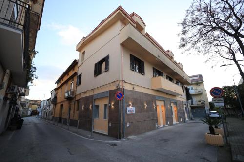 a building on the side of a street at B&B REVOLUTION BED e BREAKFAST in Caserta