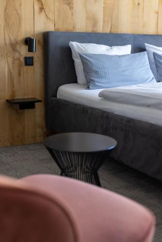 Un ou plusieurs lits dans un hébergement de l'établissement Wertschätzer Hotel - Krumme Str