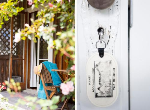 a door tag attached to a house at The Church Accommodation in Hahei