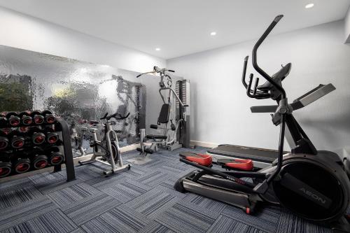 a fitness room with a gym with exercise equipment at Angkor Mansion & Residence in Siem Reap