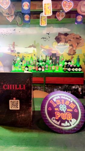 Un certificado, premio, letrero u otro documento en Hostel Chilli