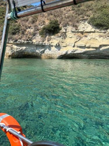 a view of a body of water from a boat at Poseidon boat trips in Svoronata