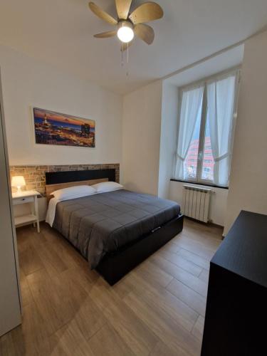 Posteľ alebo postele v izbe v ubytovaní Appartamento Sofia a Genova