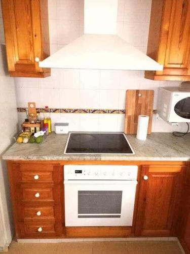 Dapur atau dapur kecil di Beachfront Calella Duplex