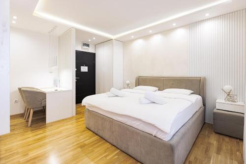 Katil atau katil-katil dalam bilik di White Apartments