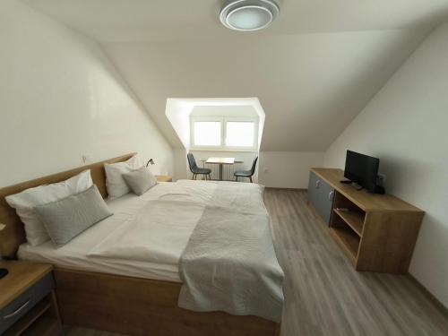 Guesthouse Haler 객실 침대