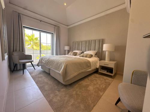 Postel nebo postele na pokoji v ubytování Sunshine - PINHEIROS ALTOS