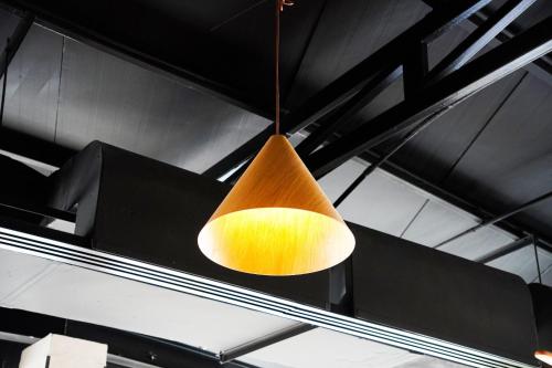a light hanging from the ceiling in a room at Swissôtel Al Murooj Dubai in Dubai
