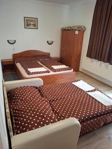 Postel nebo postele na pokoji v ubytování Birta Apartman