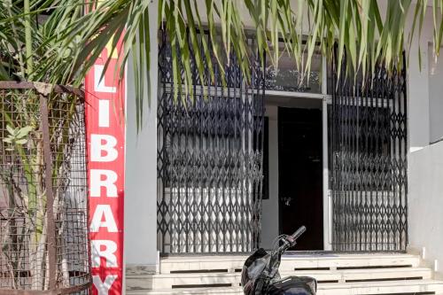 a motorcycle parked in front of a building at Hotel O Star The View in Kānpur