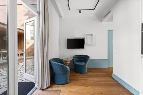 TV a/nebo společenská místnost v ubytování Eclectic Hotel Copper