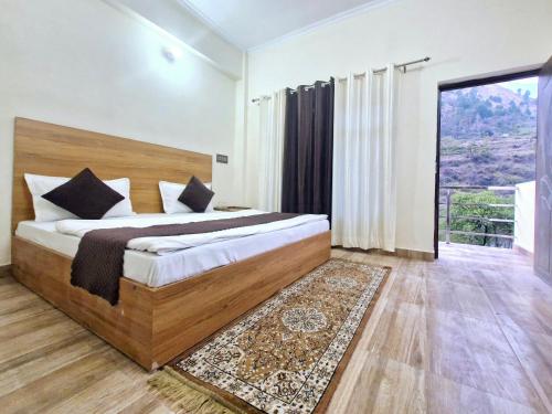 Postel nebo postele na pokoji v ubytování Hotel Aashirwad