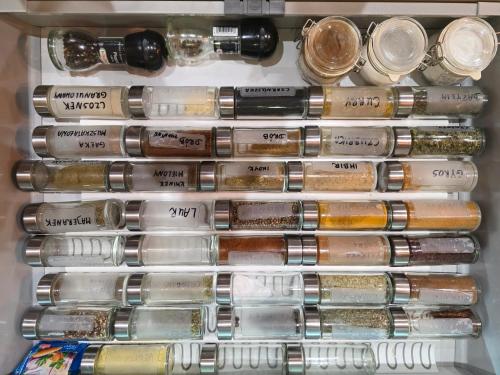 a drawer full of different types of makeup brushes at Forest Zen Małastów dom z prywatną balią z widokami na las in Małastów