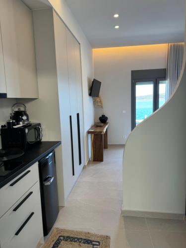Kuchyň nebo kuchyňský kout v ubytování Casadei luxury sea view apartment