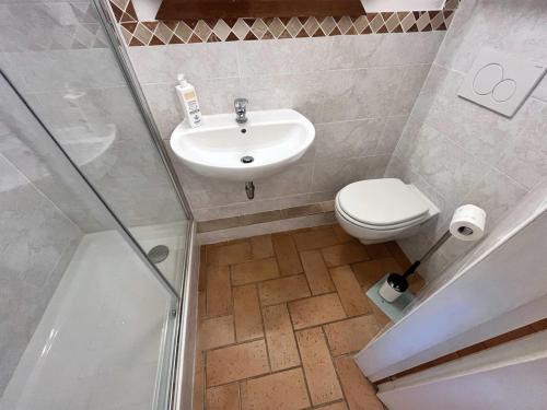 Koupelna v ubytování Casa Vacanze L'Acquerello