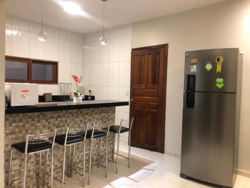 Dapur atau dapur kecil di JB Sol de Verão Hospedagem