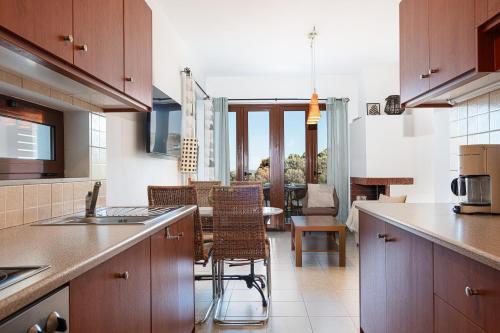 Plakoti Apartment 5, shared pool and amazing view