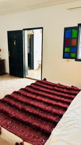 Postel nebo postele na pokoji v ubytování RIAD DAR ESSOURY Marrakech