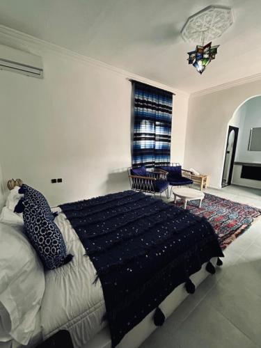 Postel nebo postele na pokoji v ubytování RIAD DAR ESSOURY Marrakech