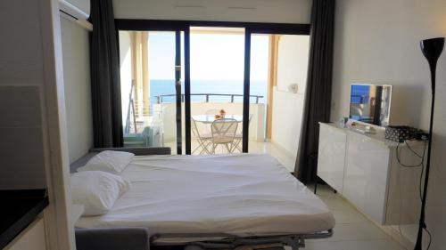 Posteľ alebo postele v izbe v ubytovaní Appartement 753, 4 personnes, vue mer By Palmazur