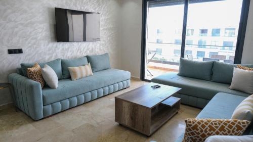 Zona de estar de Studio Cosy avec Vue Piscine El Mansouria