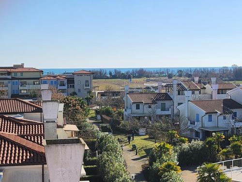 an aerial view of a city with houses at Appartamento Torre Blu in Caorle