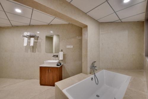 Ένα μπάνιο στο Soil to Soul Trinity Hotel - A Boutique Stay