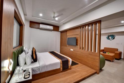 Ένα ή περισσότερα κρεβάτια σε δωμάτιο στο Soil to Soul Trinity Hotel - A Boutique Stay