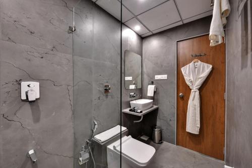 Ένα μπάνιο στο Soil to Soul Trinity Hotel - A Boutique Stay