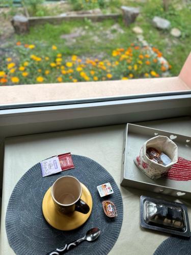Kemudahan buat kopi dan teh di Buenavida Guesthouse