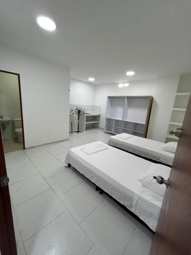 Postel nebo postele na pokoji v ubytování Hospedaje - Casa Alameda