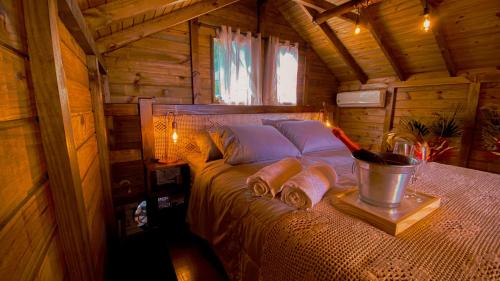 Cama o camas de una habitación en Chalé Morada dos Tucanos