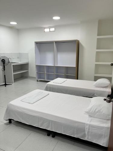 Postel nebo postele na pokoji v ubytování Hospedaje - Casa Alameda