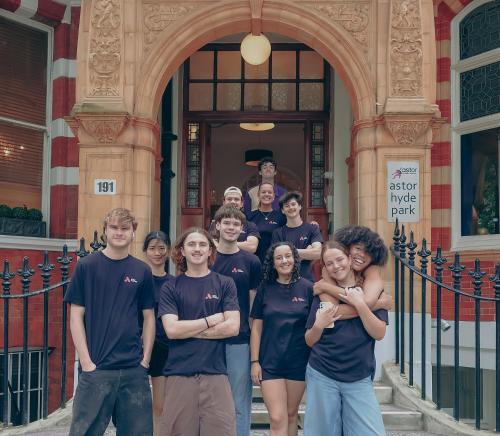a group of people standing in front of a building at Astor Hyde Park Hostel in London