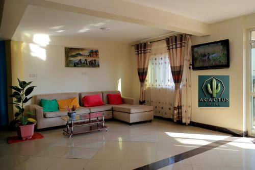 Χώρος καθιστικού στο Acactus Hotel