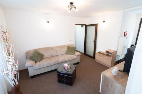 Χώρος καθιστικού στο Mini Apartament