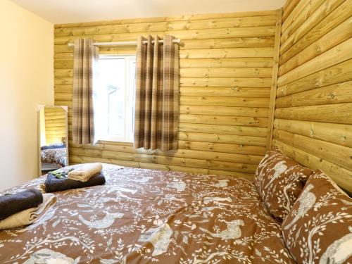 Ένα ή περισσότερα κρεβάτια σε δωμάτιο στο Rabbit Warren Lodge