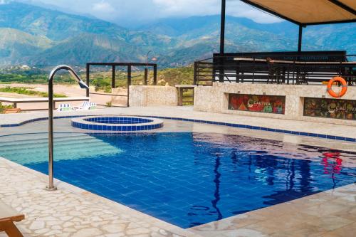 Bazén v ubytování Casa Hotel Cautiva nebo v jeho okolí