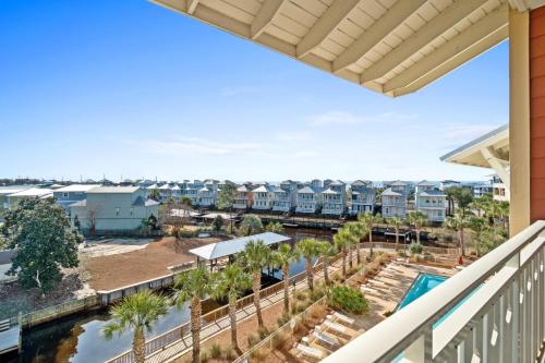 a balcony with a view of a resort at Waterside Village by Panhandle Getaways in Mexico Beach