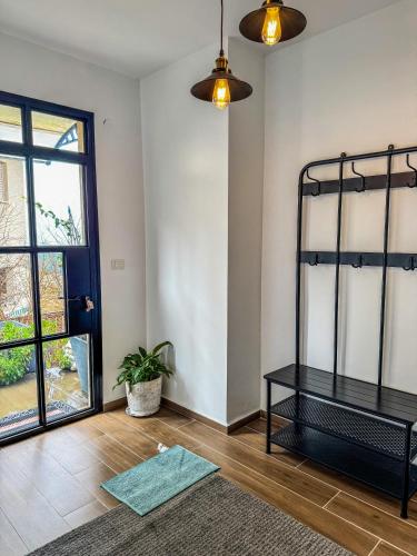 a room with a bunk bed and a window at Lana's Guest House in Ḥurfeish