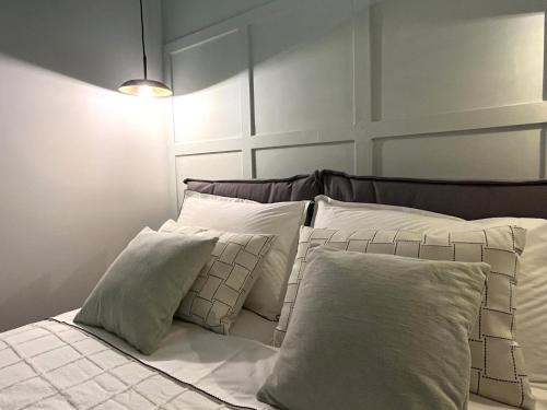 Ένα ή περισσότερα κρεβάτια σε δωμάτιο στο Insula - Apartments & Comfort in Ortigia