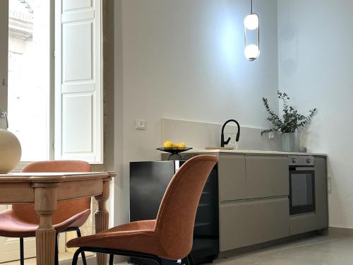 Η κουζίνα ή μικρή κουζίνα στο Insula - Apartments & Comfort in Ortigia