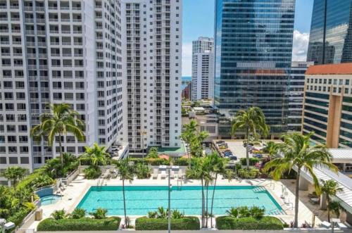 a view of a pool in a city with tall buildings at Brickell Floor 31 Sea View-Free Parking by Palermo Home Miami in Miami