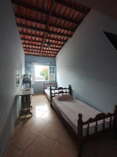 Katil atau katil-katil dalam bilik di Apartamento Favo de Mel 3