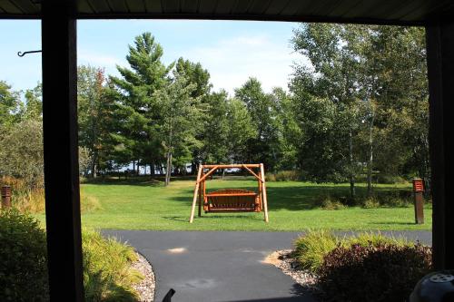 a view of a playground from a window at 2 Bedroom Condo at Wild Eagle Lodge in Eagle River