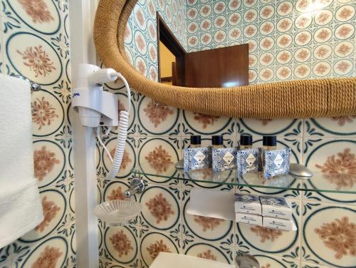 Ένα μπάνιο στο Apartamentos Turisticos Praia Grande