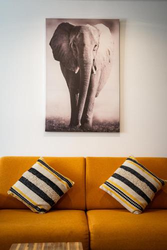 a black and white picture of an elephant on a wall at Les Loges du Luberon in Coustellet