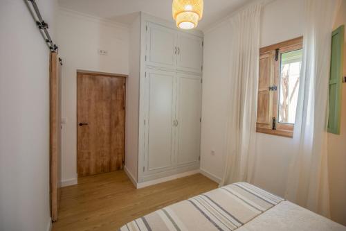 Ένα ή περισσότερα κρεβάτια σε δωμάτιο στο Villa Emilia